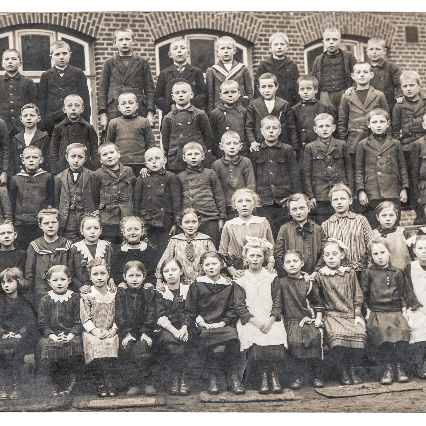 Old photo school classmates Children outdoors Vintage picture Old photo of school classmates. Group of children and teacher outdoors. Vintage picture with original film grain and blur
